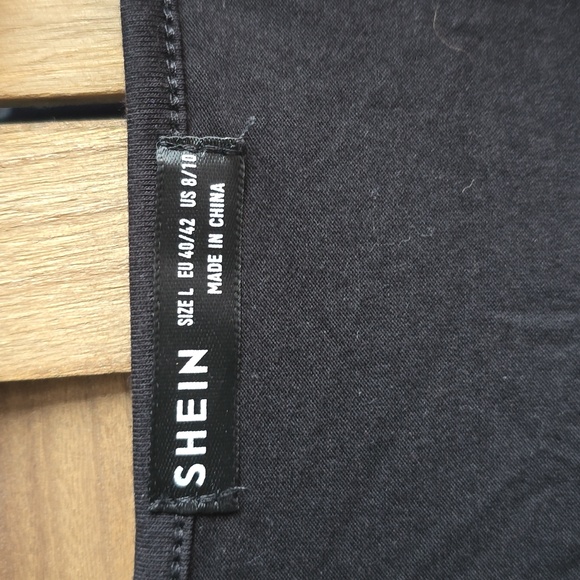 Black cotton dress with bows on shoulders - Picture 2 of 4